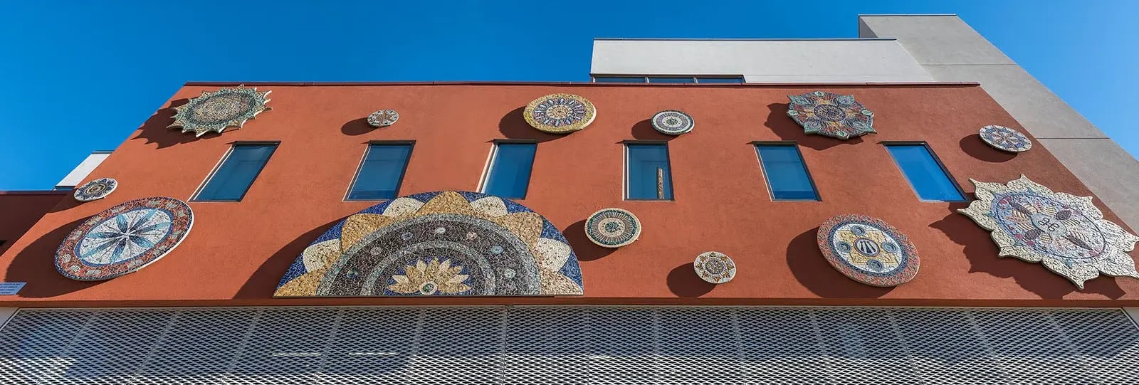 Completed mandalas on the side of the LAFLA offices.